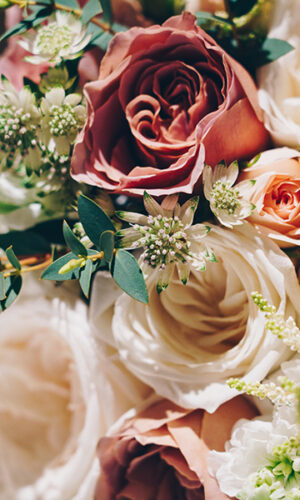 Closeup shot of a beautiful flower composition for a wedding ceremony on a blurred background